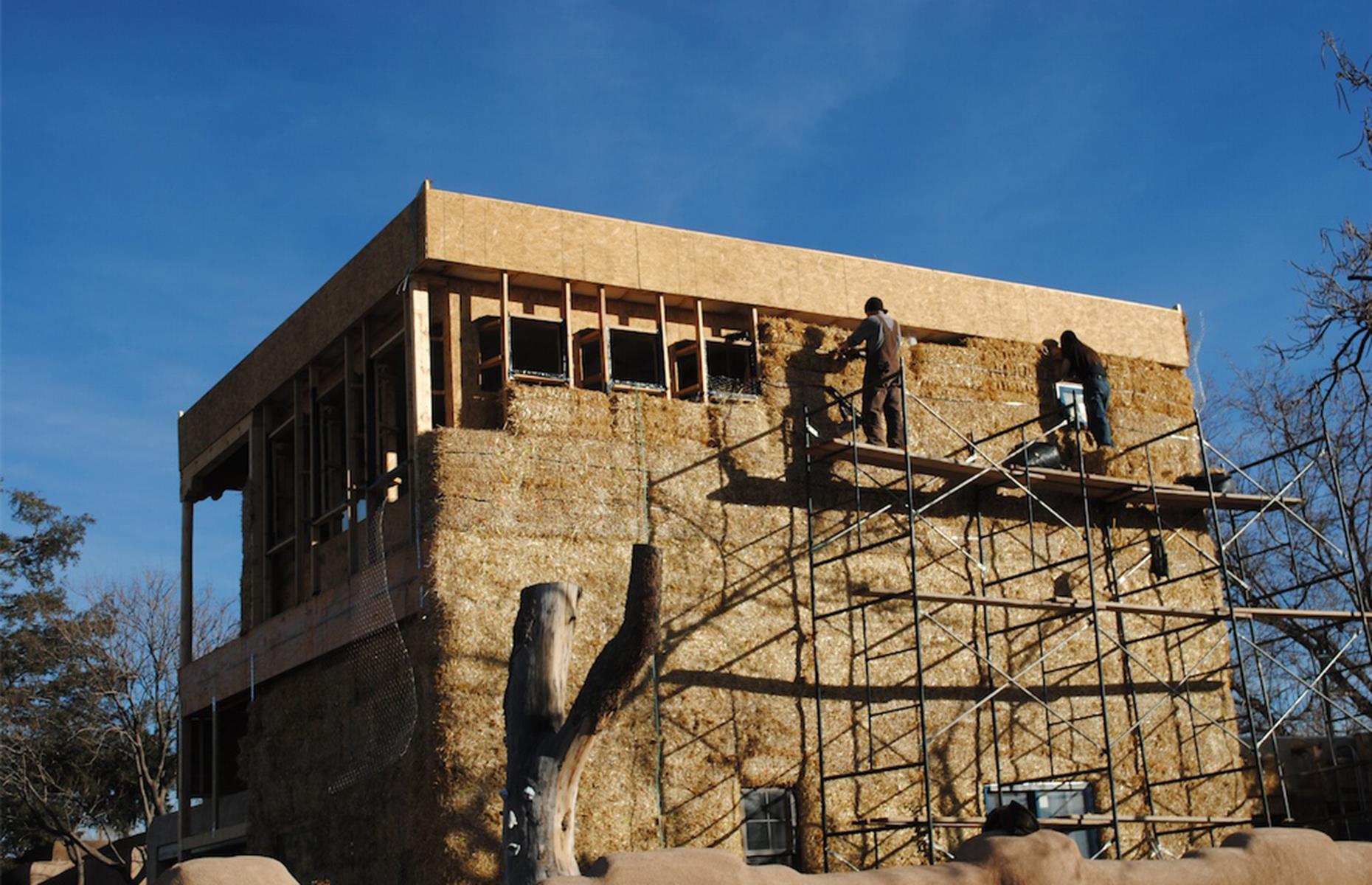 Pale pink straw bale house, New Mexico, USA